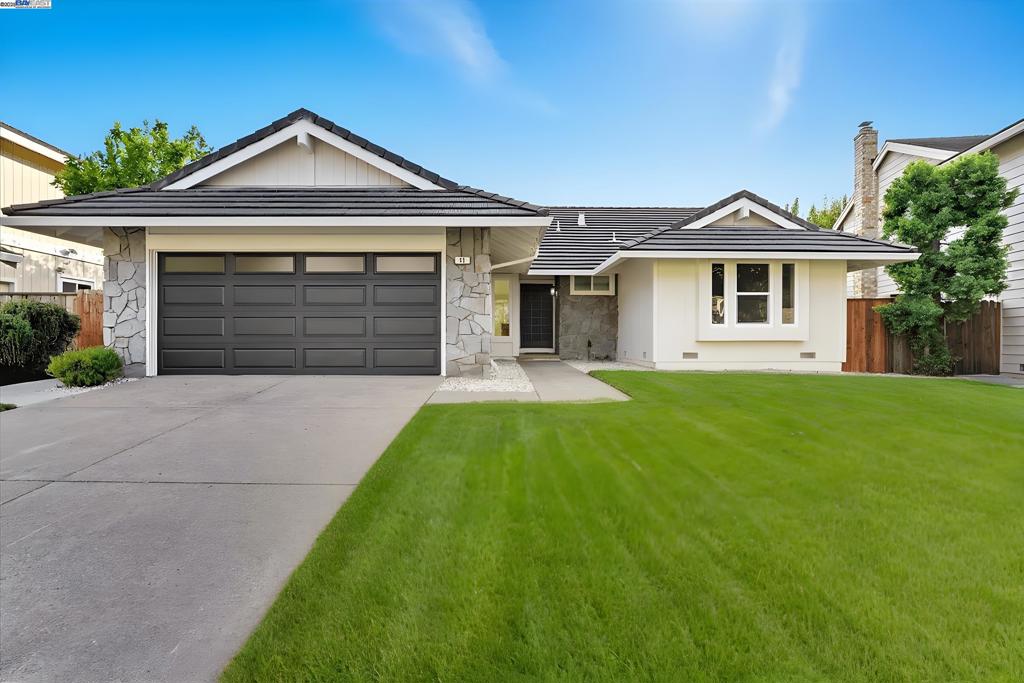 Welcome to 11 Paddock Ct, a beautifully updated home on a quiet Pleasant Hill cul-de-sac. The remodeled kitchen features sleek European cabinets, quartz counters, and stainless steel appliances, opening seamlessly to the dining and living areas for easy entertaining. New hardwood floors run throughout, while large double-pane windows bring in abundant natural light and improve energy efficiency. The spacious living room with a cozy fireplace creates the perfect gathering spot, while updated bathrooms and generously sized bedrooms provide comfort for the whole household. The primary suite offers a private retreat feel with modern finishes. Step outside to a landscaped backyard with plenty of space for outdoor dining, gardening, or play. Whether hosting friends or enjoying a quiet morning coffee, the yard serves as a true extension of the living space. Located close to top-rated schools, parks, shopping, dining, and convenient commuting routes, this home blends style, comfort, and location. Move-in ready and thoughtfully upgraded, 11 Paddock Ct is the perfect place to call home. A Must See!