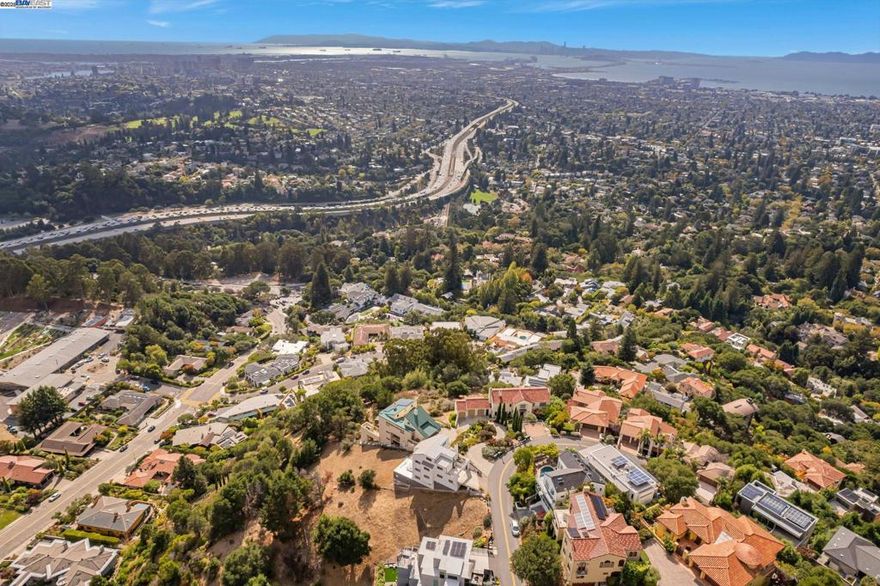 ON TOP OF THE WORLD! Custom built home features PANORAMIC views as far as the eye can see! From Mill Valley to Redwood City! The Golden Gate, San Francisco and beyond. Views from every room. Impressive home featuring new kitchen, stainless steel appliances, high soaring ceilings, Versatile Art/yoga loft. Hardwood Flooring, loads of storage and oversized garage!