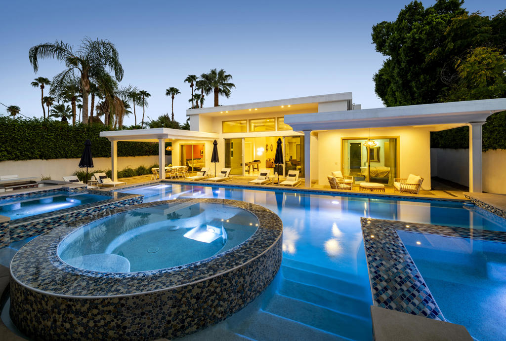 Tahquitz River Estates Luxury Retreat - Where Modern Elegance Meets Resort-Style LivingImagine waking each morning in a sun-drenched Palm Springs oasis, where modern design, breathtaking mountain vistas, and effortless indoor-outdoor living converge. This exquisite 5-bedroom, 4-bathroom home in the coveted Tahquitz River Estates, built in 2018, offers nearly 2,800 square feet of sophisticated living space crafted for both comfort and celebration. Enter through soaring ceilings and dramatic clerestory windows that fill the open living areas with natural light, creating an airy and inviting atmosphere. The chef-inspired kitchen, outfitted with custom cabinetry, premium appliances, and expansive countertops, is a masterpiece for entertaining or savoring quiet culinary moments. Retreat to any of the five luxurious bedrooms, including three private en-suites, where design meets tranquility. Step outside to your personal resort: a sparkling custom pool and spa, built-in barbecue, and shaded patios set the stage for everything from elegant soirees to serene evenings under the stars, all framed by panoramic mountain views. Situated on a generous 9,583-square-foot lot and just minutes from downtown Palm Springs, this home offers instant access to world-class dining, boutique shopping, art galleries, and scenic hiking trails. Whether you seek a permanent residence, a weekend sanctuary, or a lucrative vacation rental, this property delivers an unparalleled blend of luxury, lifestyle, and timeless Palm Springs charm.OPEN HOUSES Thursday to Sunday 11-3 Oct 16-19 Stop on by to see this gorgeous home.