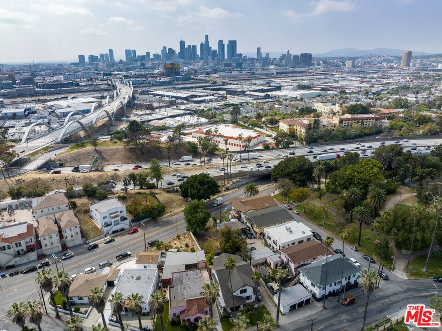 Potential development opportunity in the heart of Boyle Heights, just moments from Hollenbeck Park and the new 6th Street Bridge. Vacant 5,206+/- sqft lot offering what appears to be potential for up to 3 units + 2 ADUs (5 units total subject to City approval and buyer verification). The front portion of the lot is sloped but seems to level out across much of the site. Notably, the adjacent multifamily property at 2038 Hollenbeck Dr (MLS#25574667) is also available, forming an L-shaped configuration with this parcel. While each can be acquired individually, purchasing both may create a unique opportunity for expanded development across approximately 11,418+/- sqft total lot size or for long-term portfolio value (buyer to independently verify any use potential or entitlement feasibility). Located near Metro lines, DTLA, Mariachi Plaza, and the vibrant Arts District, this site is positioned in one of LA's most rapidly evolving neighborhoods. Renderings are conceptual only and provided for inspiration. Buyer to conduct their own due diligence with appropriate agencies.