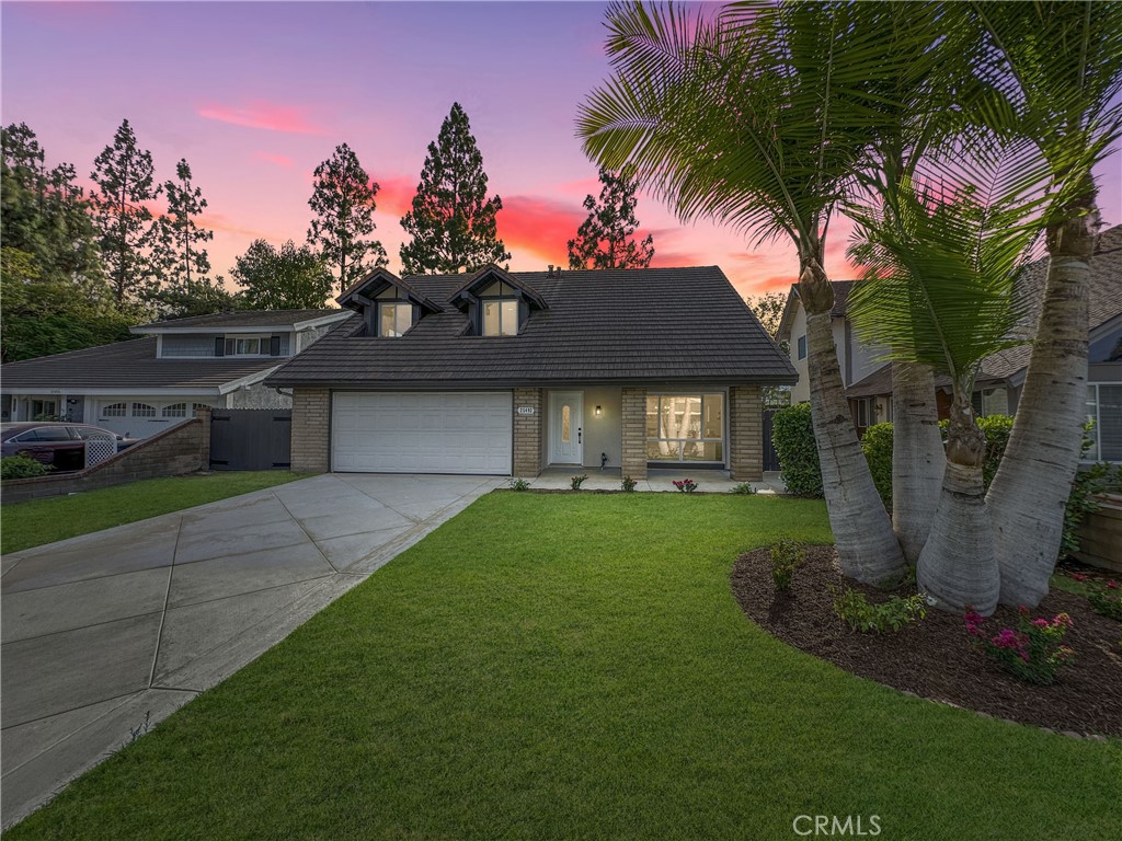 Step into elegance with this meticulously remodeled 4-bedroom, 2.5-bathroom residence, perfectly positioned at the end of a quiet cul-de-sac in the highly desirable Woodleaf II community of Lake Forest. This turnkey home boasts all-new custom interior and exterior paint, luxury vinyl plank flooring throughout, and a striking custom staircase. The chef’s kitchen is the heart of the home, featuring brand-new white shaker cabinets with soft-close drawers, stunning quartz countertops, a breakfast bar, and an eye-catching quartz waterfall island—plus state-of-the-art appliances. The family room offers a cozy ambiance with its custom-designed fireplace, while all bedrooms include ceiling fans for optimal comfort. Bathrooms have been completely updated with seamless glass shower enclosures, sleek quartz vanities, and modern hardware. A newer custom concrete driveway and meticulously landscaped front and backyard provide strong curb appeal and plenty of outdoor living space. This is refined living in one of Lake Forest’s most charming neighborhoods—don't miss it! Professional Photos COMING SOON!