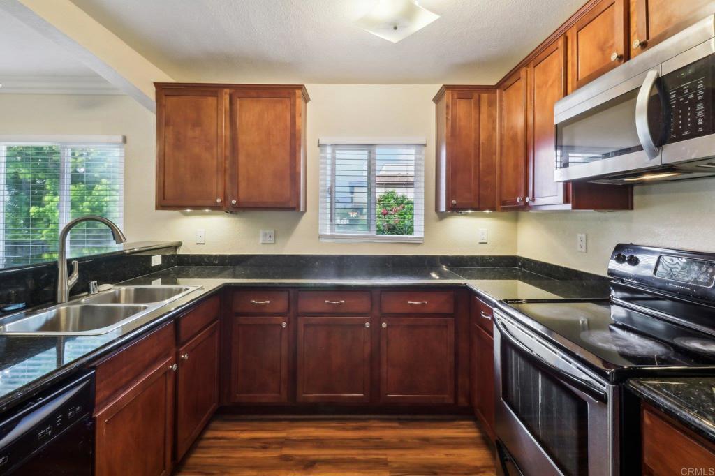 CHARMING 2-BEDROOM CONDO IN EL CAJON – MOVE-IN READY! WELCOME TO 1165 DECKER ST, EL CAJON, A BEAUTIFULLY UPDATED 2-BEDROOM, 1-BATHROOM CONDO THAT’S PERFECT FOR COMFORTABLE LIVING. 2 ASSIGNED PARKING SPOTS IN GATED COMPLEX. FRESHLY PAINTED THROUGHOUT, THIS HOME OFFERS A BRIGHT AND INVITING SPACE WITH AN OPEN-CONCEPT LAYOUT. STEP INSIDE TO FIND A SPACIOUS LIVING AREA THAT FLOWS SEAMLESSLY INTO THE KITCHEN AND DINING SPACE. ENJOY A PRIVATE BALCONY, PERFECT FOR RELAXING WITH YOUR MORNING COFFEE OR UNWINDING IN THE EVENING. THE IN-UNIT LAUNDRY ADDS CONVENIENCE, MAKING EVERYDAY LIVING EFFORTLESS. LOCATED IN A WELL-MAINTAINED COMMUNITY, THIS CONDO IS CLOSE TO SHOPPING, DINING, AND FREEWAY ACCESS—IDEAL FOR COMMUTERS OR ANYONE LOOKING FOR A GREAT PLACE TO CALL HOME. DON’T MISS OUT ON THIS FANTASTIC OPPORTUNITY!