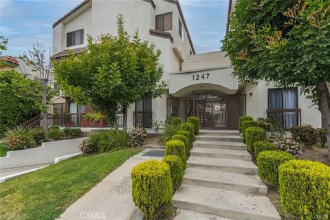 Photo of 1247 E Wilson Avenue E #9, Glendale, CA 91206 (MLS # GD26089300)