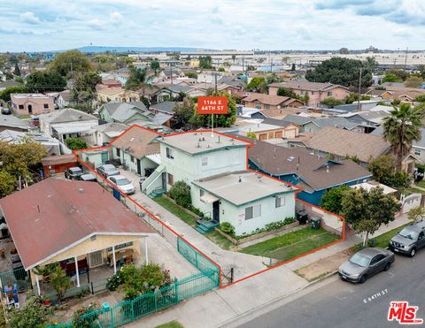 Photo of 1166 E 64th Street, Los Angeles, CA 90001 (MLS # 26672131)