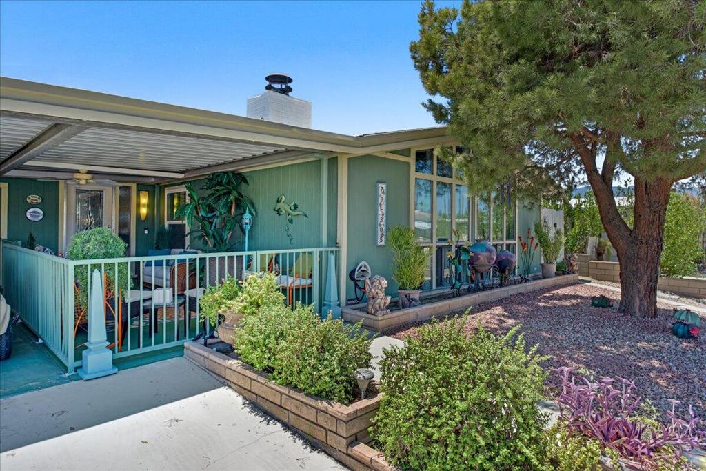 This beautifully remodeled home has everything you need. Just missing your personal items to make this your desert home. Remodeled kitchen has quarts counter tops, customized under cabinet lighting, as well as under cabinet floor lights. Soft close cabinets, and a beautiful soft colored backsplash. This home also features paid SOLAR to save on electric. A real wood fireplace for those nice cozy nights located in the family / kitchen area. There is a separate space for an office or craft room complete with its own air conditioning unit. There is a large private patio sitting area to enjoy the wonderful desert evenings. Come see this gem today.