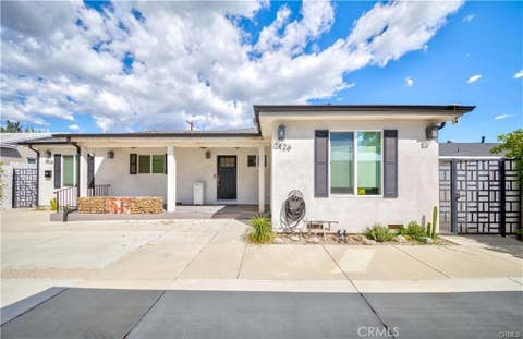 Photo of 7426 Leescott Avenue, Lake Balboa, CA 91406 (MLS # AR26114607)