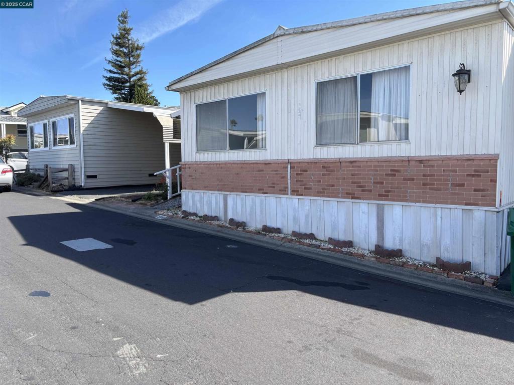 Looking For a Large Mobile Home in a Senior Citizen Park? Here you go! Great Floor Plan includes Living Room, Dining Room, Family Room and 2 Large Bedrooms and 2 Baths! Spacious Side Porch Deck leads to Yard Space for a Possible Garden. Two Car Tandem Parking. Set Up A Time to Show!!! Fireplaces: NO