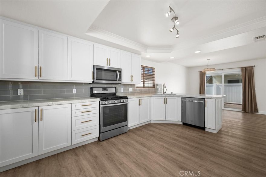 Nestled in the heart of highly sought-after Eastside Costa Mesa, this beautifully updated home combines modern style with comfortable living. Featuring 3 spacious bedrooms, 2.5 bathrooms, and 1,832 sq. ft. of thoughtfully designed space, it offers everything you need for both everyday living and effortless entertaining.



The remodeled kitchen is a chef’s dream with quartz countertops, stainless steel appliances, and sleek updated cabinetry, all seamlessly flowing into the dining and living areas. The bright and inviting living room showcases a cozy gas fireplace and abundant natural light, creating a warm, open-concept feel throughout the main level.



Upstairs, the primary suite serves as a private retreat with a walk-in closet and a spa-like bathroom featuring a soaking tub and separate shower. Two additional bedrooms and a newly remodeled full bathroom provide comfort and flexibility for family and guests. A large loft space offers endless possibilities — perfect for a home office, playroom, gym, or wellness area.



Additional highlights include central air conditioning, an attached two-car garage with laundry area, and a private patio ideal for outdoor dining or relaxing in a serene, landscaped setting.



Just minutes from Orange County’s best beaches, parks, shopping, dining, and top-rated schools, this home offers the perfect blend of convenience, comfort, and coastal lifestyle appeal.