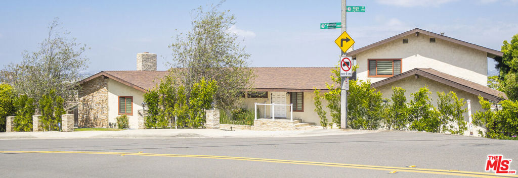 Experience panoramic city light views from this stunning home located in one of Torrance's most prestigious neighborhoods. Featuring 3 spacious bedrooms with walk-in closets, 3 full bathrooms, and a large bonus room perfect for a home gym or office. The master suite and bonus room are conveniently located on the lower level for privacy and comfort. Enjoy two separate living rooms, each with a cozy fireplace, dramatic high ceilings, and an abundance of natural light throughout. The kitchen opens to a dining area that looks out onto the spectacular view. Attached garage, beautifully landscaped backyard ideal for entertaining or intimate gatherings. Located within an award-winning school district and quiet, private surroundings this is truly a rare opportunity.