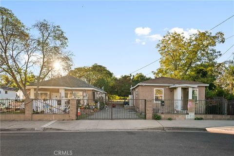 Photo of 277 N Myrtle Ave, Pomona, CA 91768 (MLS # AR25248565)
