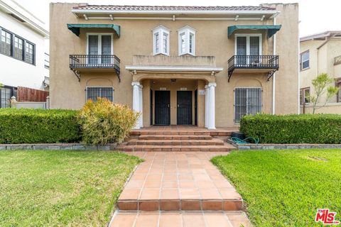 Photo of 1206 3rd Avenue, Los Angeles, CA 90019 (MLS # 24439989)