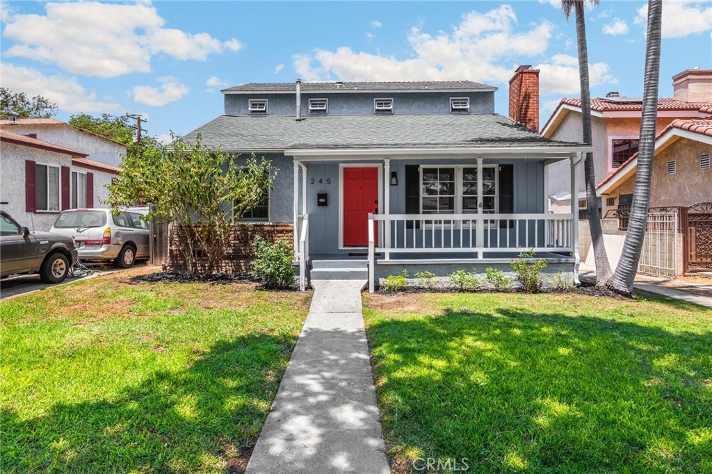 Located in the heart of Bixby Knolls, this inviting pool home is bursting with charm, character, and modern upgrades that make everyday living feel like a staycation. From the moment you arrive, you’ll appreciate the curb appeal and classic design—but it’s what’s inside that really shines. Step into the formal living room, where a cozy fireplace and built-in bookcases create the perfect setting for quiet evenings or entertaining guests. Need extra space? A flexible bonus room offers endless possibilities—use it as a den, home office, or even a 4th bedroom. The updated, open-concept kitchen is a true standout, featuring sleek stone countertops, stainless steel appliances, and recessed lighting. Whether you’re whipping up a weeknight meal or hosting brunch with friends, this space is as functional as it is stylish. Just off the kitchen is a dedicated laundry area for added convenience. Downstairs, you’ll find a spacious bedroom and a beautifully renovated full bath—ideal for guests or multigenerational living. Upstairs, the additional bedrooms and contemporary baths offer comfortable retreats, with a mix of hardwood, laminate, and tile flooring throughout the home adding warmth and easy maintenance. French doors off the living area open to a stunning backyard oasis. Picture yourself relaxing on the deck with a morning coffee or diving into the pool for a refreshing afternoon swim. And yes—there’s even a diving board! Car enthusiasts and hobbyists will love the oversized tandem garage with charging station, offering room for 3-4 vehicles or plenty of space for a workshop or home gym. This is your chance to own a move-in-ready home in one of Long Beach’s most beloved neighborhoods—just moments from local shops, restaurants, parks, and top schools. Come see why Bixby Knolls continues to be one of the city’s most sought-after communities!