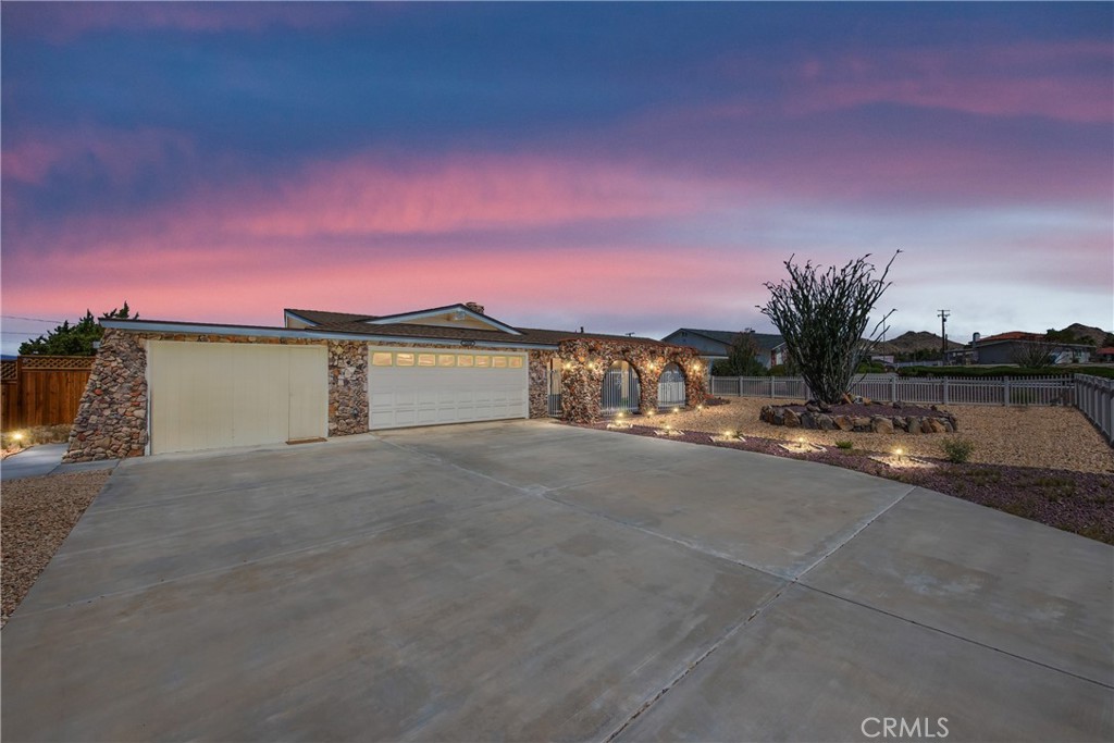 First time on the market since 1983! This well-loved 3 bedroom, 2 bathroom pool home in Apple Valley sits on nearly 1 acre of fully gated land—offering space, privacy, and unlimited potential. Got toys? Park your trailers, boats, RVs, fifth wheels, camping gear, and play toys—this property has the space to do it all! The solar-powered gate provides easy backyard access, and the mix of wood and vinyl fencing ensures privacy all around. In addition to a 2-car attached garage, the home also features three detached garages and multiple storage units, making it a dream setup for classic car lovers, collectors, or anyone needing serious space. Out back, enjoy your own private retreat with a pool, a covered patio, and a beautiful gazebo, perfect for relaxing or entertaining guests. Inside, you’ll find recessed lighting and a warm, functional layout that’s been cared for with pride over the decades. This is a truly special opportunity to own a versatile and private home in one of Apple Valley’s most desirable areas. Room to grow, room to store, and room to enjoy—don’t miss this one
