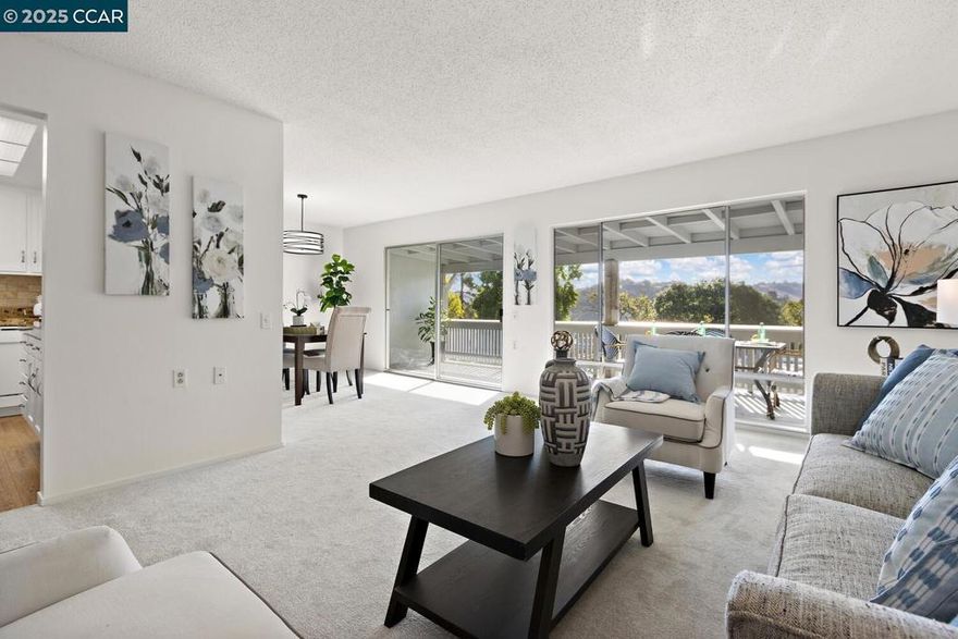 Welcome to the thriving community of Rossmoor! Step into this 2 bed/1 bath meticulously maintained Sequoia. This move-in ready unit features granite countertops and tiled backsplash in kitchen, new carpet and paint throughout, mirrored closet doors, stacked washer/dryer and stall shower.  Views of the valley from the deck. Carport (with extra storage), guest parking and bus stop close by. Rossmoor offers so much more than just a place to live! Fitness center, pools, movie theater, pickleball, tennis, golf, walking trails, clubs and so much more. Whether you prefer relaxing in the peace of your home or engaging in the multitude of activities, you will love calling Rossmoor home.