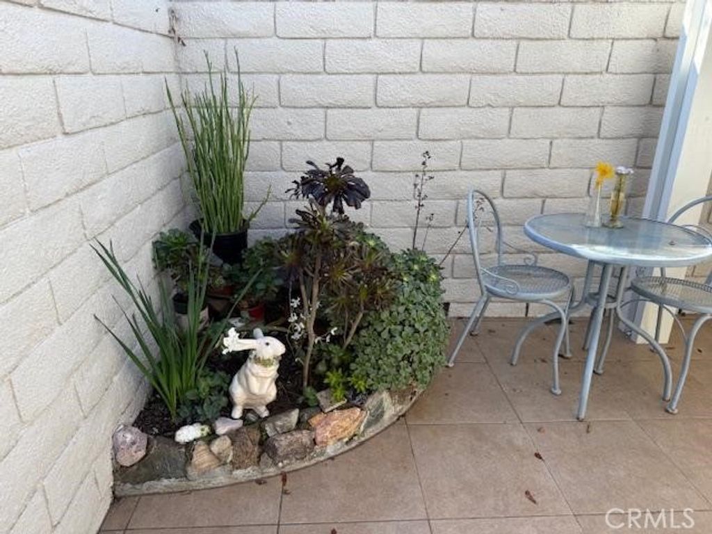 Photo of 2082 Ronda Granada #D, Laguna Woods, CA 92637 (MLS # OC25275501)