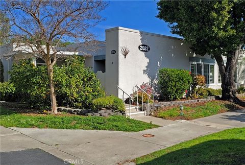 Photo of 2082 Ronda Granada Unit D, Laguna Woods, CA 92637 (MLS # OC25275501)