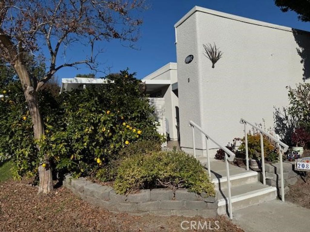 Photo of 2082 Ronda Granada #D, Laguna Woods, CA 92637 (MLS # OC25275501)