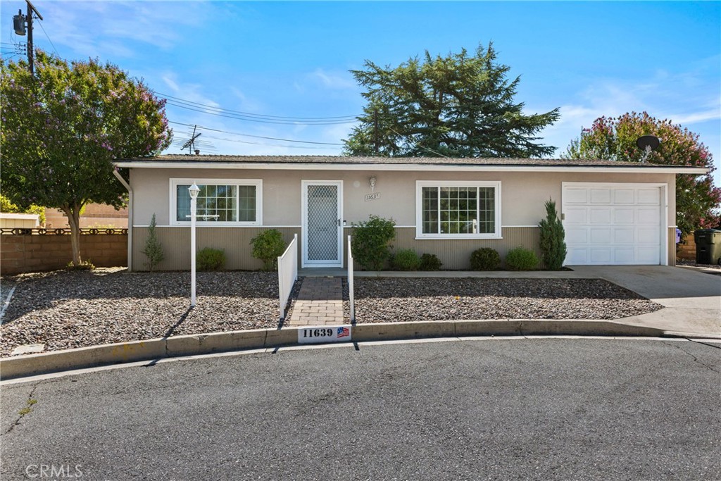 Cozy single story home located in the 55+ community of Sun Park 1 in upper Yucaipa on a quite cul-de-sac, This is a wonderful home boasts great character with two bedrooms and one full bathroom, living/dining room and nice kitchen with oak cabinetry. Property features freshly cleaned carpets and tile flooring throughout, Updated Dual pane windows, new heater and air conditioning that’s only one year old, additional closet space in hallway and tiled backsplash with tile flooring in the bathroom/shower area. This home comes with refrigerator + washer and dryer. Step out into your fully enclosed patio that features it own a/c vent, separate laundry room with sink and additional toilet. This fully enclosed patio could be used for an additional room for entertaining or having quests stay over. This wonderful home also features a larger lot than most in the community with over 5,000 square feet you will enjoy the fully landscaped backyard with lush trees and rose bushes. Take advantage of the community features and amenities that are just a few steps away from your new home to include: clubhouse with workout equipment, pool table, putting green, pool, and outside fire pit all this plus its conveniently located to nearby stores, historic down town Yucaipa shops and the Yucaipa regional park. Come see this great home today!!!