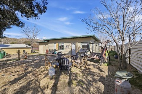 Photo of 7559 Chemehuevi Way Way, Yucca Valley, CA 92284 (MLS # JT26034971)