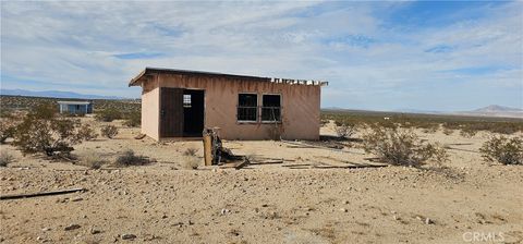 Photo of 1234 Brent Cross Road, 29 Palms, CA 92277 (MLS # JT25223927)