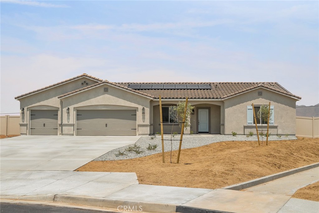 Hermosa
Make a lasting impression with this gorgeous new construction home in Apple Valley. Designed for modern living, this single-story home offers three bedrooms and two bathrooms, exuding charm and warmth throughout. The open-concept layout seamlessly connects the kitchen and family room, making it the perfect space for entertaining. Retreat to the master suite, which features a luxurious en-suite bathroom with a spacious shower and a walk-in closet. This home includes an array of high-end upgrades at no additional cost, such as granite countertops, energy-efficient kitchen appliances, a Wi-Fi-enabled garage door opener, solar panels, and more.