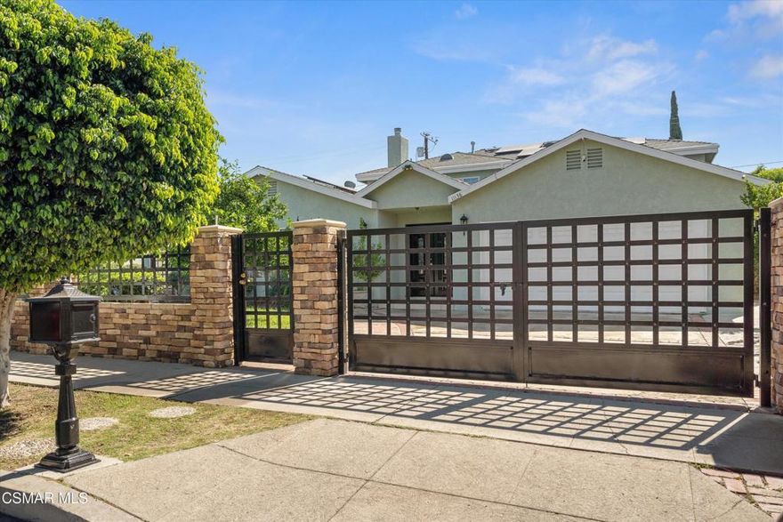 Garage has been converted into an ADU-style living space with its own entrance and private bath.In addition, the main home features three more bedrooms with en-suite bathrooms, including two primary suites. The upstairs primary spans the entire level and enjoys a private exterior entrance, a spacious living area, and sweeping neighborhood views -- an ideal setup for multigenerational living or a private retreat.Behind the gated entry, you'll find secure parking and mature fruit trees -- lime, orange, grapefruit, and lemon. The backyard feels secluded and centers around a sparkling pool, creating a resort-like environment for entertaining or quiet relaxation.Additional highlights include a tankless water heater and a location that connects you quickly to the 118, 405, 210, and 5 freeways, as well as Porter Middle, Danube and Haskell Elementary, and Kennedy High.