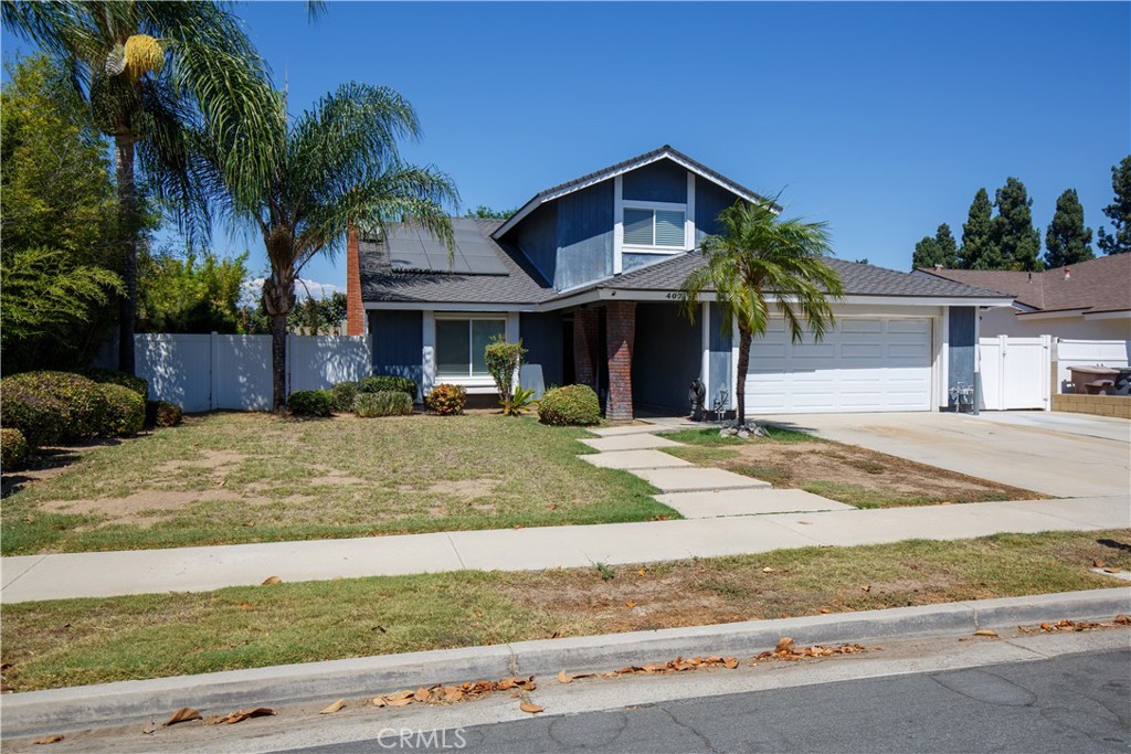 Deal alert for family unit or investor! Here is your opportunity to own a magnificent home in in the heart of Placentia, and your chance to make it all your own. This home is on peaceful Lavender lane which is just steps from Goldenrod park, award winning schools, Placentia Library, and just a short drive to middle Placentia where you'll find shopping, the post office and fine restaurants. The first floor here boasts vaulted ceilings, a half bath and 1 bedroom down...while upstairs you'll find a full hall bath and 3 more bedrooms with one being En-suite. The open kitchen space has tremendous opportunity for upgrades, with direct access to the big backyard where summertime lounging and family time are begging for action. The homes does have upgraded windows to reduce noise and keep the temperature steady, and solar panels which significantly slashed the utility bill. Other large parks are nearby for fishing, walking and concerts... as are local colleges and universities, and access to both the 57 and 91 freeways. Placentia's Motto is "A pleasant place", and this home and neighborhood surely embody that phrase. Don't miss your opportunity, so please reach out and have a look before it's gone!