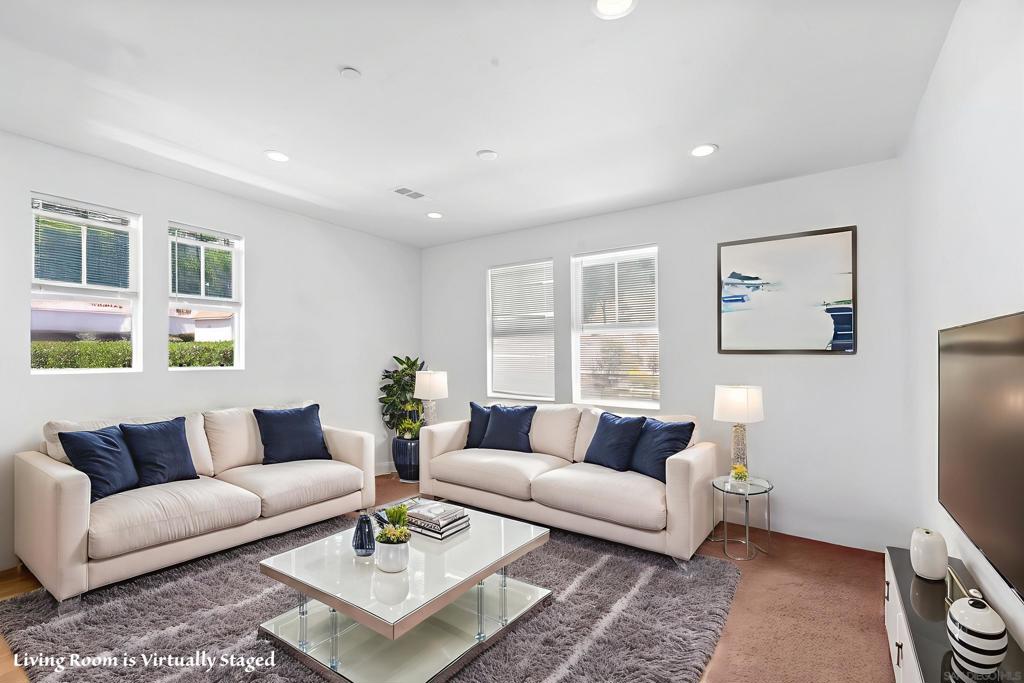 You'll know you're somewhere special when you drive into this beautiful, breezy, upscale Spring Valley location. This stunning Aurora Plan 2 corner townhome offers the perfect blend of modern design, eco-conscious features, and everyday comfort in a peaceful, family-friendly community. Just 1.5 years young and with owned solar, this Energy Star certified home is filled with light. With 3 spacious bedrooms and 3.5 bathrooms, there’s room for everyone to live and grow. The open concept main level features a granite kitchen with stainless steel appliances. The main level bedroom with full bath is ideal for guests, extended family, or a comfortable home office. Upstairs, you'll find dual master suites with ensuite bathrooms and a dedicated laundry room. Step outside to enjoy the community pool, playground, and nearby Sweetwater County Park, where 15 miles of scenic trails and green spaces invite you to unwind. With easy access to Highways 94, 125, and 54, everything you need—from groceries to great restaurants—is minutes away. With an attached two-car garage, this home offers peace of mind and ultimate convenience. Whether you're relaxing on the balcony, enjoying a peaceful morning in the sunlit living room, or heading out for a neighborhood walk—this is more than a home. It’s a lifestyle. Come see for yourself—you’ll fall in love.