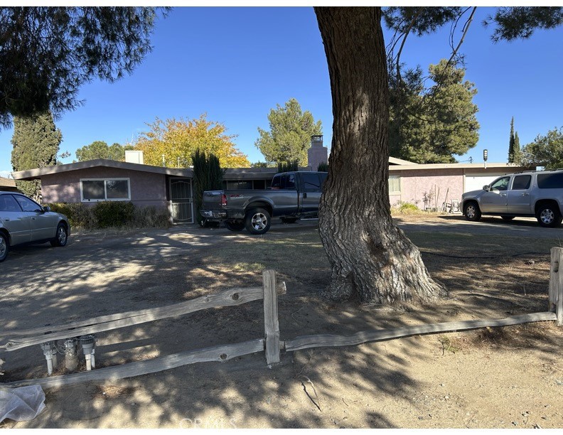Newly paint and flooring on unit A. close to free way and shopping. Unit A possible can be 3 bed room. each unit has private fend yard. unit B has attached garage. Tenants paid water and trash. A legal non Conforming zoned duplex. This area has been re-zoned C1 neighborhood service. Hight visibility of Bear Valley rd. Property can still be legally used as rental income or modified to a C1 use. Please verify with City for any modifications of usage and for more units.