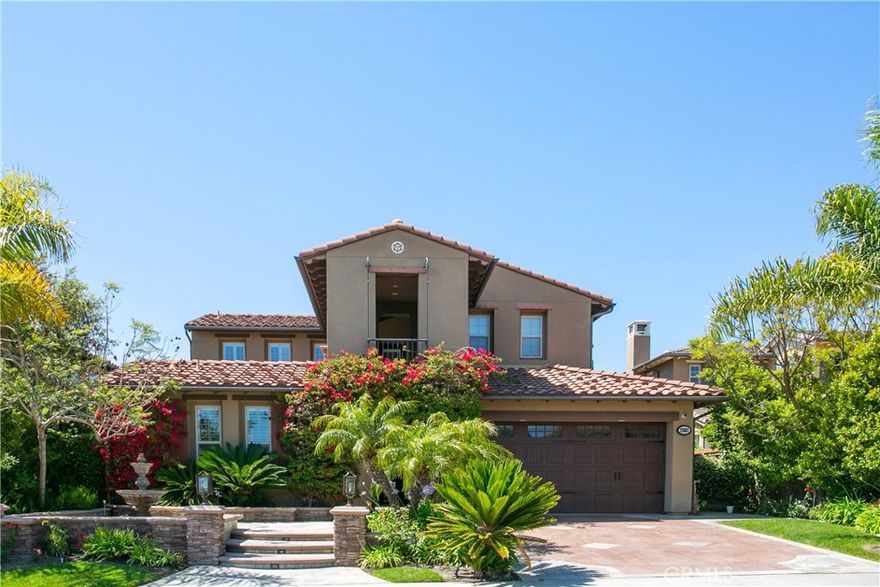 Highly upgraded, John Laing home in the ocean-close gated community of Belle Cliff at Pacifica San Juan. With a downstairs Master suite and a detached casita with ensuite bath, this 5 bedroom 5.5 bath home offers exceptional living and entertaining space! Enter the home through a private gate into a courtyard that separates the Casita from the main house. Once inside, the gourmet kitchen offers granite counters, center-island, 8 burner gas cooktop and dual ovens. The kitchen opens to the Great Room which features a gorgeous fireplace, surround sound speakers and a built-in bar. With no neighbors behind you, the private backyard offers an oversized built-in spa with fire pits, a bbq with island that easily seats 6, a fireplace with even more seating and a putting green...Perfect for kids or entertaining! Upstairs are 3 secondary bedrooms with en-suite bathrooms, an office/loft and balcony with ocean views. And every bedroom has built-in closets. Minutes from South Orange County's best beaches and some of the county's best schools, Pacifica San Juan provides easy access to downtown San Juan Capistrano, Dana Point and San Clemente.  Coupled with the incredible amenities Pacifica San Juan has to offer - a pool, spa, gym,cooking area, clubhouse, RV parking as well as many hiking, biking and walking trails, this home provides exceptional quality in an exceptional location!