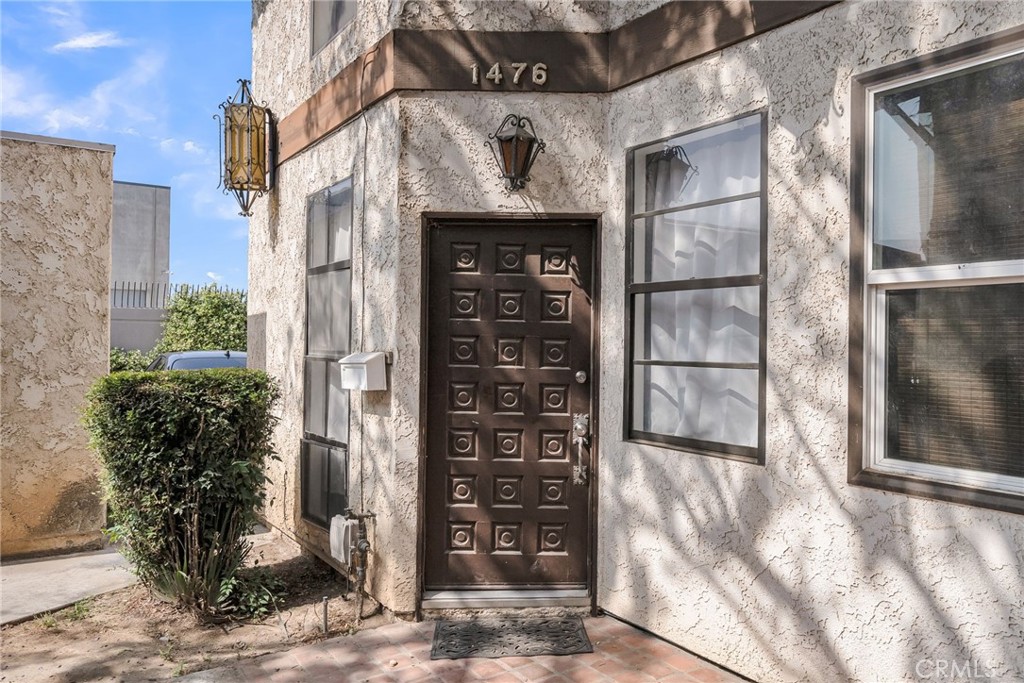 Welcome to this beautifully updated condo located in a prime Riverside location near University Village and UCR. This move-in ready home features fresh paint, brand-new flooring throughout, and a modern kitchen equipped with a new refrigerator and stove. Step inside to vaulted ceilings and an open-concept living space that feels airy and inviting. The spacious primary bedroom is conveniently located on the main level and offers a private en-suite bathroom. Upstairs, you’ll find two additional bedrooms, a full bathroom, and a dedicated laundry area for added convenience. Enjoy low-maintenance living with artificial turf and your own private one-car garage. Located just minutes from shopping, dining, and freeway access, this property is perfect for everyone from: students, professionals, or investors looking for proximity to campus and city conveniences. Don't miss this turnkey opportunity in one of Riverside’s most desirable locations!