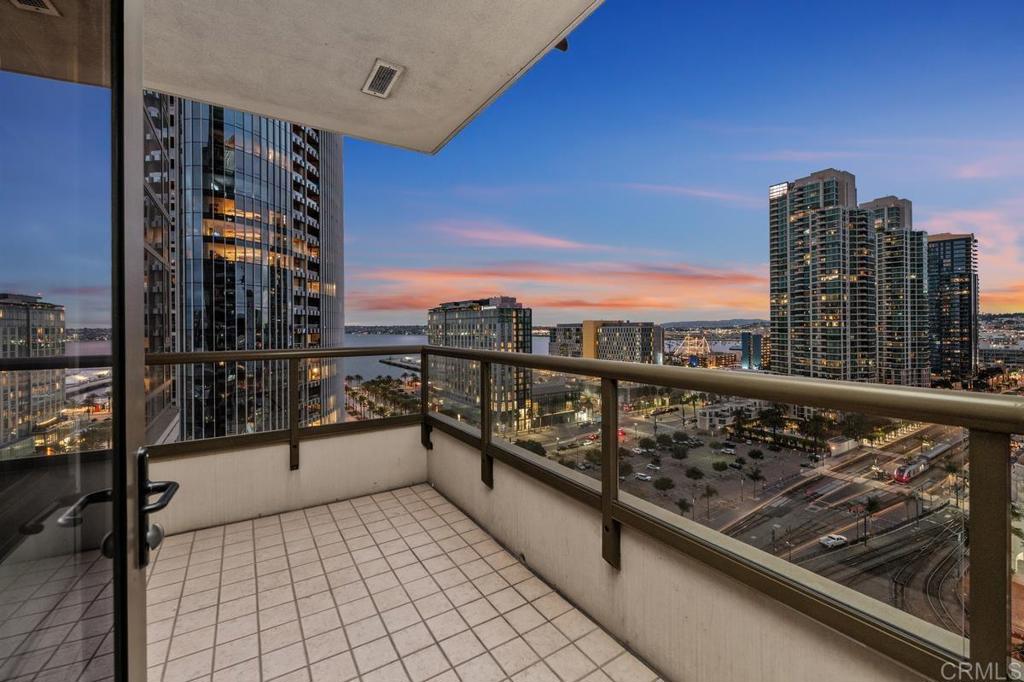 Situated in the heart of Downtown San Diego, this upscale 2-bedroom, 2-bath residence on the 16th floor offers breathtaking views of the sparkling ocean, Coronado Bridge, yacht-filled marina, and planes gracefully landing on the runway. Floor-to-ceiling windows provide stunning daytime sunshine and evening sunsets on one side, while the opposite view showcases the vibrant city skyline illuminated at night—bringing a touch of New York energy to San Diego living. The home has been refreshed with brand-new flooring, interior paint, and plush carpeting. The modern kitchen is equipped with high-end stainless steel appliances. Built by renowned Bosa Development, this community offers resort-style amenities, including a fully equipped fitness center, pool, spa, barbecue/picnic area, billiards room, banquet and meeting facilities, and a beautifully appointed lobby with 24-hour security. More than just a home, this property delivers an unparalleled lifestyle in one of the most desirable cities in the world. Priced to sell!