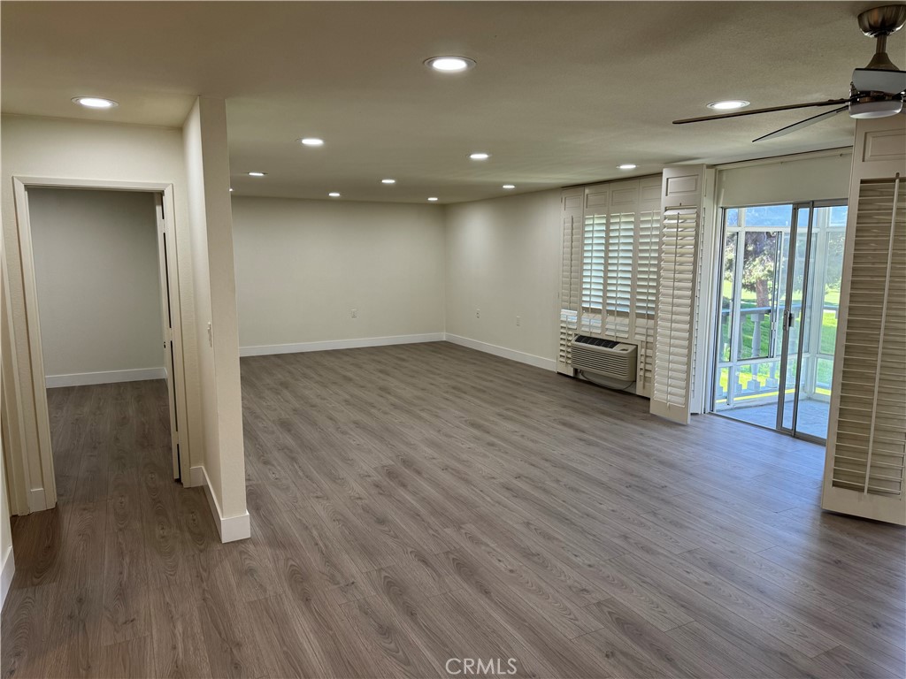 Welcome to Laguna Woods spacious Garden Villa Model. Great opportunity in this single-level condo on the second floor with golf course and lush greenbelt views. Updated just one year ago with all new hard-surface flooring, recessed LED lighting and fresh light paint colors, make this the perfect place to call home. New recessed LED lighting in all rooms. Close proximity to elevator and laundry. The building is convenient to Club House 4. Enjoy the glass enclosed balcony with views to the Golf Course. Balcony has two sets of sliding glass doors, one from the dining room and the other from the living room. Views of golf course, trees and green lush landscape from living room, dining and Primary bedroom. Spacious floorplan with the bedrooms located at opposite ends of the home for maximum
privacy. Heat pumps for cooling and heating in living room and Primary Bedroom. Prestigious 55+ Gated Community for Active Adults in Laguna Woods Village. Essential Kitchen is Light & Airy with a Garden Window. Subterranean parking garage with storage, you can take the elevator to your home or use stairs from your assigned underground parking. Walk outside of your home to meet your neighbors for a game of cards in the courtyard or meet at the full REC ROOM. Residents also enjoy golf, tennis, 7 clubhouses, 5 pools, 4 spas, 3 fitness centers, 250 clubsand organizations, equestrian center, Performing Arts Center and transportation. 7 miles to Laguna Beach. Easy Access to Freeways, Shopping and Dining. Don't wait and miss this First Floor Garden Villa with 2 Bedrooms with large closets in both bedrooms with plenty of storage and two bathrooms.
