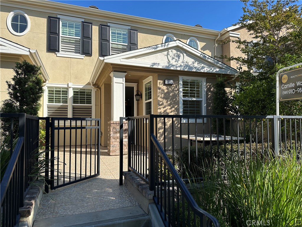 Location! Location! Location! View of 180-degree of central park featuring mature trees, a beautiful clubhouse, and a water fountain. This townhome is one of only seven in the development that offers a full view of the park and boasts a double-sized front yard. It is a highly upgraded model with elegant Italian tile flooring on the lower level and hardwood floors upstairs. Enjoy the crown molding in the living area and master suite, along with custom plantation wood shutters throughout. The downstairs area includes a designated space for a home office, and there’s a loft upstairs equipped with TV connections. This home commanded a selling price of $50K more due to its prime location when purchased from developer excluding the numerous upgrades. The large master bedroom offers a view of the park, along with an expansive bathroom featuring a soaking tub, separate shower, and walk-in closet. The neighborhood is truly beautiful, with the park serving as the central attraction. It is conveniently located near District Shopping, Costco. Hoag urgent Care, Grocery store, Restaurants and bank all within walking distance. It is close to the heart of Irvine, as well as all freeways. Club provides all amenities including large swimming pool. An ideal location!