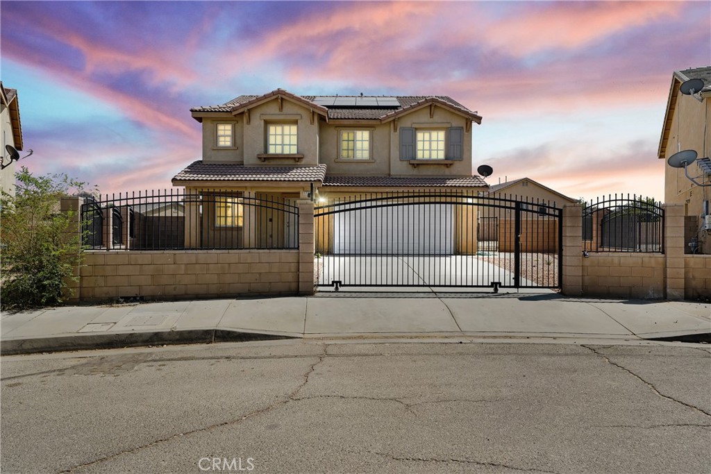 Welcome to this spacious and tastefully upgraded single-family residence in Lancaster, built in 2007 and offering approximately 2,781 square feet of living space on a generous 0.28-acre lot. Designed with both comfort and entertaining in mind, this home provides four well-sized bedrooms and three full bathrooms, perfectly suited for family living or hosting guests. Step inside to a bright and inviting interior where fresh paint and select new flooring create a clean, move-in-ready atmosphere. The main level features a large family room anchored by a cozy fireplace, perfect for gatherings and relaxing evenings. An open loft upstairs provides a flexible space for a home office, playroom, or media area, while the laundry room on the upper level adds everyday convenience. The well-appointed kitchen is ideal for culinary enthusiasts, showcasing a gas range, dishwasher, disposal, microwave, and upgraded finishes. Whether you're preparing weeknight meals or entertaining friends, this kitchen is ready to perform. Built for lasting quality, the home is finished with a stucco exterior and a durable tile roof. A two-car attached garage provides secure parking and storage. For year-round comfort, the home is equipped with central heating and central air conditioning. Located in a desirable Lancaster neighborhood, this residence combines style, space, and practicality—an excellent opportunity for those seeking a move-in-ready home with modern touches and room to grow.