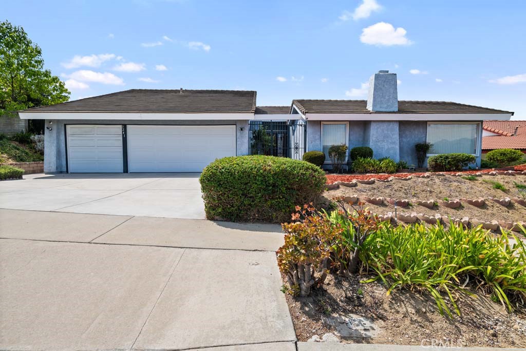 Welcome to this stunning SINGLE-STORY HOME featuring 3 bedrooms, 2 1/2 bathrooms, and 2,397 sq ft of living space on a 9,815 sq ft lot. Perched in a prime location of Hacienda Heights, this home captures BREATHTAKING VIEWS from multiple vantage points.
Step inside to discover an inviting open layout filled with natural sunlight, creating a bright and welcoming atmosphere throughout. The home features a remodeled kitchen, high ceilings in the living room, two fireplaces-one in the living room & one in the family room all showcase stunning panoramic views, making everyday living feel extraordinary.
The primary suite is generously sized, while the additional bedrooms provide comfort & flexibility.
Outdoors, the relaxing backyard is the perfect spot to unwind, with a gorgeous view from both the backyard & kitchen window. A spacious 3-car attached garage & wide driveway provide ample parking and storage.