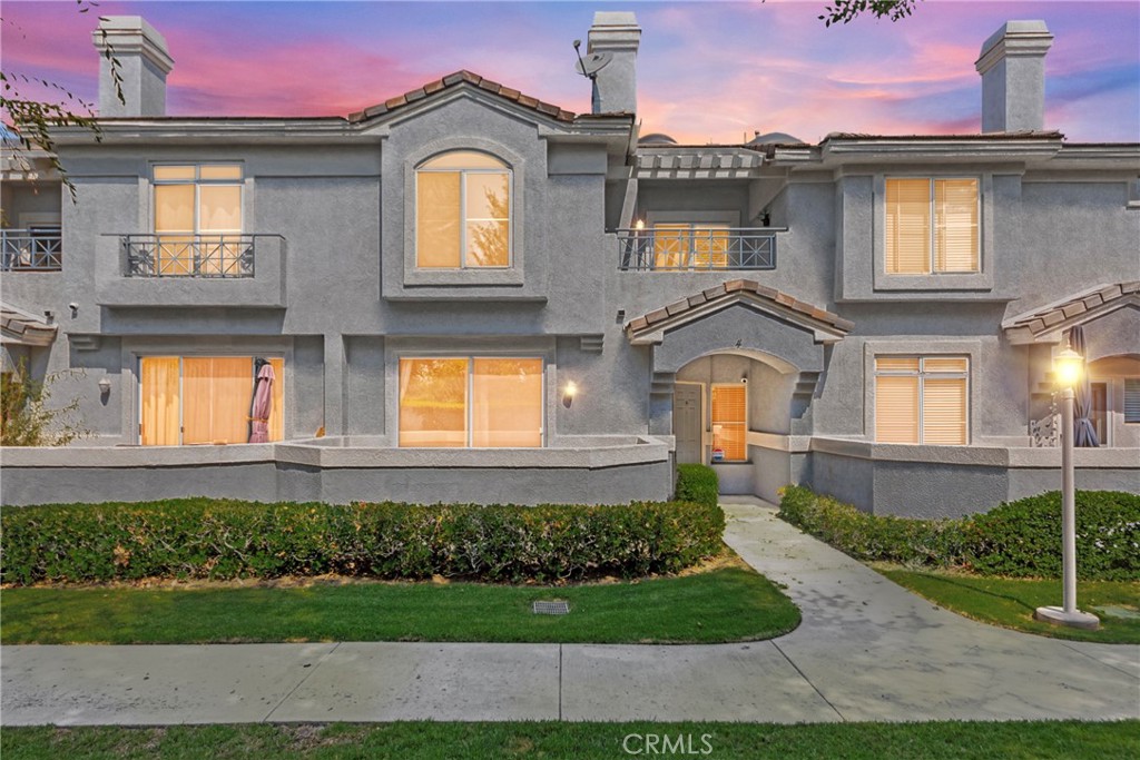 Stylish & Spacious Townhome in the Heart of Corona! Welcome to this professionally designed 3-bedroom, 2.5-bathroom home in one of Corona’s most desirable communities. With a private patio, attached garage, and beautiful community amenities, this property offers comfort, style, and unbeatable convenience. Step into a bright and airy open-concept floor plan featuring plenty of natural light. The spacious living and dining area is ideal for gatherings, complete with a cozy fireplace and glass sliding doors that open to your private front patio—perfect for entertaining or relaxing. The well-maintained kitchen offers ample storage and counter space, ready to inspire your inner chef. Upstairs, the luxurious primary suite is a peaceful retreat, complete with a private balcony, walk-in closet, and a spa-like en-suite with dual sinks and plenty of space to unwind. Additional features include: Attached garage for convenience, Low HOA and low taxes, Access to a community pool and beautifully landscaped grounds Enjoy a location that’s walking distance to shopping, dining, movies, parks, and hiking trails, and just minutes from the 91 and 15 freeways, making commuting a breeze. This is the perfect opportunity to own a stylish, low-maintenance home in a vibrant and well-connected neighborhood. Don’t miss your chance to call this Corona gem your own!