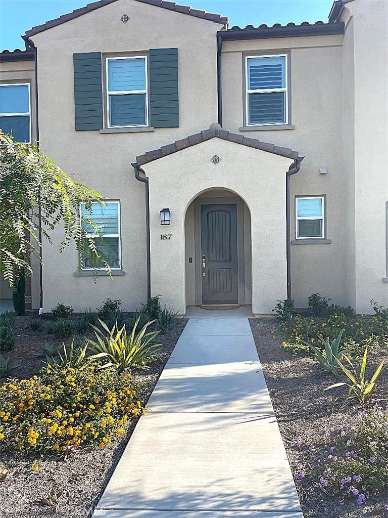 Welcome to this spacious 3 bedroom + office, 2 ½ bath, practically new condo (completed 11/2024) with too many upgrades to mention. The kitchen is a chef’s dream with high-end appliances, generous storage, sizable pantry, soft-closing drawers, marble countertops, tile backsplash, curio display cabinet over wine/beverage refrigerator, under cabinet lighting and pendants over expansive island with breakfast bar. Open floorplan flows front to back providing substantial space for dining, entertaining, and relaxation appointed with tasteful flooring and plantation shutters. The front looks to open space with picturesque footbridge over creek bed leading to adjoining neighborhood, convenience stores and local dining spot with easy access to freeway. Downstairs also includes private office and half bath. The back opens to charming, private patio with solar lighting, vinyl decking with built-in seating and patch of artificial grass (pet friendly) with access for both people and small dog/cat (built-in pet door), and two-car garage access where you will find electric car charger and water softener. Upstairs boasts a spacious primary suite with walk-in closet, dual sink vanity, oversized shower, and lavatory with heated bidet seat. You will also enjoy two additional bedrooms, guest bathroom, laundry, small retreat; great for exercise equipment, ironing/sewing, or reading nook, and the dual zone air conditioning. The community has a clubhouse, pool, spa, and barbeques in a park-like setting for your enjoyment. Owner will pay some utilities and HOA. Pristine condition reflects meticulous landlord’s pride of ownership, looking for like-minded tenant.