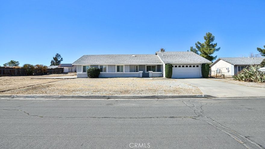 Charming Move-In Ready Single-Story Home on an Expansive Lot!



Welcome to this bright and inviting 4-bedroom, 2-bathroom home offering 1,560 sqft of comfortable living space. High vaulted ceilings and abundant natural light create a warm, open atmosphere that instantly feels like home.



Sitting on a generous 17,625 sqft lot, this property provides endless possibilities. The home is positioned on one side of the lot—leaving plenty of room to build an ADU, park RVs or boats, or design your dream outdoor entertainment area.



Inside, enjoy a cozy fireplace, central A/C, and an attached 2-car garage for convenience. The thoughtful layout combines comfort and functionality, making it perfect for families or those seeking a peaceful retreat.



Under market value, this move-in ready home presents a rare opportunity with great potential for added value. Enjoy beautiful desert views and a prime location close to schools, shopping, and commuter routes.



Don’t miss this opportunity to own a spacious home on a huge lot — whether for family living, investment, or future development!