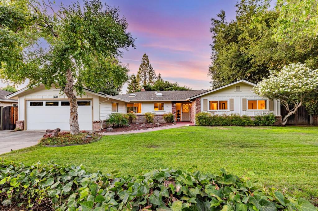 Welcome to this charming home located in a quiet, tree-lined Los Altos neighborhood. Boasting 1,834 sq ft of living space on a generously sized lot, this home offers comfort & convenience. The well-appointed kitchen includes a lg window, custom, maple cabinets, an electric cooktop, built-in oven, dishwasher, & refrigerator, all complemented by a skylight that bathes the area in natural light. An abundance of cabinetry provides ample storage with convenient pull-out shelving, including in the lg pantry cabinet. A dining area adjacent to the kitchen features another lg window & second skylight, providing a light and bright space. The primary suite with attached bathroom incl. a lg walk-in closet & door to the backyard. Gleaming laminate flooring runs throughout most of the home, & the cozy fireplace in the living room is perfect for relaxing evenings. The dedicated laundry room with utility sink is connected to the attached garage. Two separate living spaces, & three doors leading to the covered patio & generous backyard, ensure ample space for entertaining or a peaceful respite. Located within the excellent Cupertino Union Elementary School District, & close to many parks, shopping centers, restaurants, cafes, freeways, & hi-tech companies, this home is a perfect fit to call home!