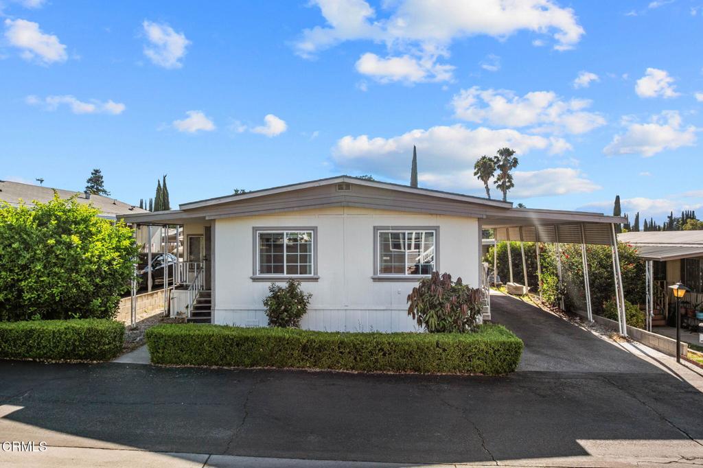 Welcome to this beautifully maintained home located in the desirable Family Park community on the peaceful edge of Simi Valley. Surrounded by scenic hillside views and a quiet, friendly atmosphere, this home offers the perfect blend of serenity and convenience.The property features an open-concept layout that seamlessly connects the living room, dining area, and kitchen. It is ideal for both everyday living and entertaining. High vaulted ceilings in the living room and recessed lighting throughout enhance the sense of space and natural light.Inside, the home is move-in ready and has been meticulously cared for. The thoughtful layout accommodates a variety of lifestyles and provides flexibility for comfortable daily living.As part of the well-kept Family Park community, residents enjoy the added benefit of ample guest parking and a peaceful environment that feels tucked away but is still close to major freeways, shopping centers, restaurants, and essential services.Whether you're a first-time buyer or looking to downsize without compromising on quality, this home is a standout option. With its open living spaces, quiet setting, and prime Simi Valley location, this property offers both charm and long-term value.