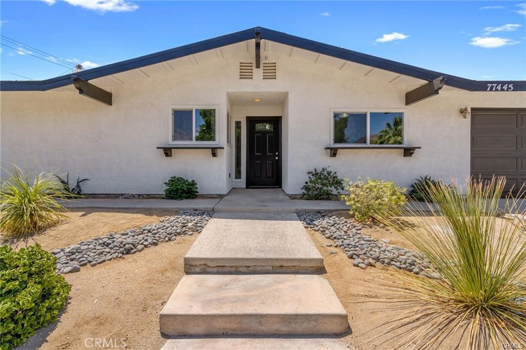 This home sits on an oversized, elevated corner lot one block from the top of La Quinta Cove. This premium location provides stunning mountain views and proximity to multiple trails and destinations, including Bear Creek Trail, Cove to Lake Trail, and Cove to Oasis Trail and Picnic Area. The exterior was recently painted and has great curb appeal and easy access to the RV PARKING on the side of the home. The floor-plan is perfect for modern living, with the living room, dining area, and kitchen all open to each other. The wood-burning fireplace provides a focal point with the wet bar on the opposite wall. The oversized Owner's Suite has an ensuite bathroom with a full linen closet and LARGE CLOSET, a rare find in the Cove. The guest bedrooms are located on the other side of the home for added privacy. They share a hall bathroom with a shower and tub combination. You will find an additional closet and cabinets in the hallway - this home has so much storage! The washer and dryer are located in the garage. The hot mop roof is in great condition and designed to be converted to tile if the new owner desires. This home was built to last with structural upgrades that you do not find in this area or at this price point. Section 8 tenant occupied so rental income always on time and secure.