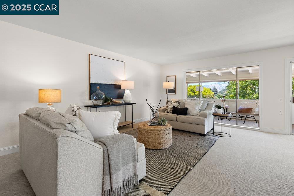 This bright and cheerful Sequoia Wrap end-unit is like a tree house with great views of Mt. Diablo and a great vibe. The enclosed wrap creates a super spot for a home office or hobby space, while the open deck invites morning coffee or evening sunsets. Windows in the kitchen and bath make the home feel even brighter. You’ll also appreciate the newer refrigerator, washer/dryer, and air conditioner, plus conveniences like smooth ceilings, a step-in shower, and in-unit laundry. Located in Rossmoor’s vibrant 55+ community, residents enjoy access to golf, pickleball, swimming, tennis, a top-notch fitness center, movie theater, art and hobby studios, and nearly 200 clubs and organizations. A welcoming space in an unbeatable setting.