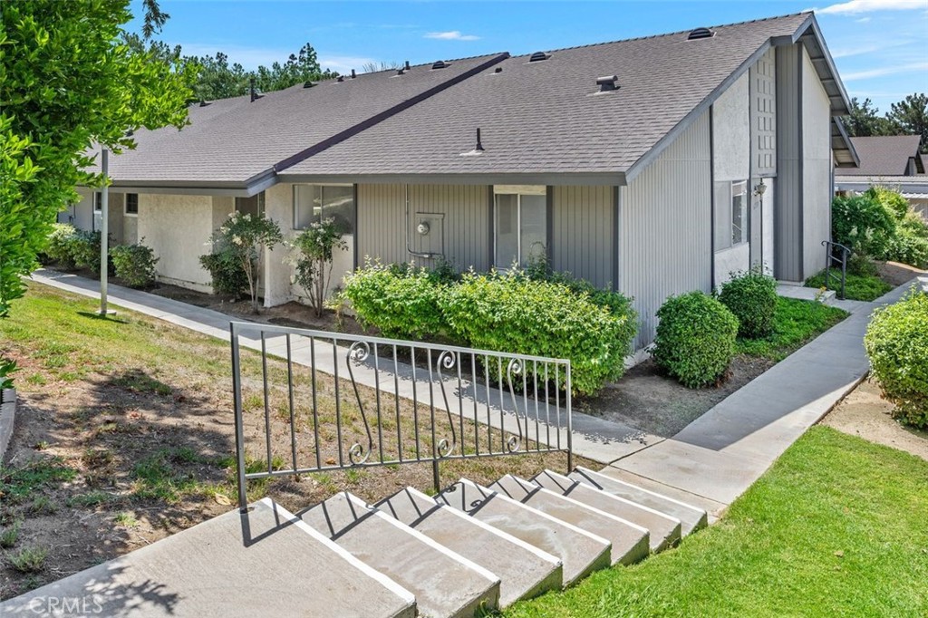 Beautifully remodeled condo in the Jurupa Hills Country Club. The layout features three bedrooms and two bathrooms, providing ample room for comfortable living. The spacious rooms throughout the home create a warm and inviting atmosphere, complemented by the abundant natural light. The new kitchen boasts modern appliances, including stainless steel models, as well as ample countertop space and cabinetry for storage and walk-in pantry. The exterior of the condominium is well-maintained, with inviting landscaping that adds to the curb appeal. The private community provides a secure and peaceful environment, while the expansion lawn and scenic surroundings offers a serene outdoor setting. Residents can also enjoy the spacious outdoor pool, perfect for relaxation and entertainment. The convenient location of the condominium allows for easy access to a variety of amenities and services, making it an ideal choice for those seeking a comfortable and well-appointed living space. Affordable and ready to move-in.