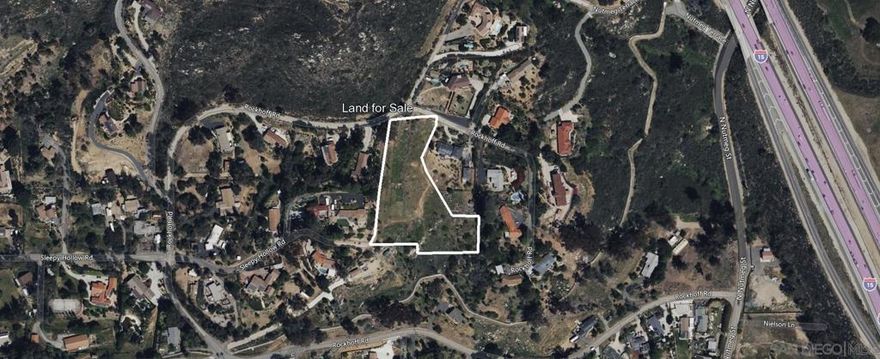 Perched in the desirable hills of West Escondido, this exceptional 2.47-acre parcel at Rockhoff Rd, Escondido, CA 92026 (APN: 224-272-58) offers breathtaking hilltop views and an outstanding opportunity to own land in a peaceful, well-established residential enclave. Surrounded by custom homes on spacious lots, this prime location combines privacy with convenience—just minutes from I-15, shopping, dining, and everyday essentials. Whether you're drawn to the sweeping vistas, quiet surroundings, or easy freeway access, this beautifully situated property captures the best of Southern California living. ****No soils reports, surveys, etc., have been done. Buyer and buyer's agent to verify all information with the city or county for allowable uses and requirements  and rely on their own investigations. **Buyer responsible for checking zoning, utilities, permits and exact property boundaries. ****
