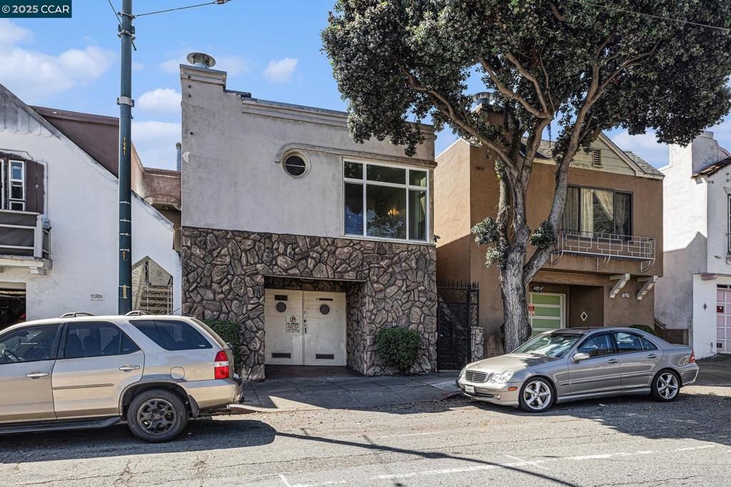 Vintage, charming 2br, 1ba home with beautiful hardwood floors, fireplace in spacious living room. Formal dining room plus eat in kitchen with separate solarium. Large undeveloped back yard, perfect for a gardener or possibly an additional ADU. Property has architectural plans that have been approved by the City of SF for completing the currently non-permitted in-law unit. 1 car attached garage, located near City College of SF, Ocean Ave shops and streetcar.