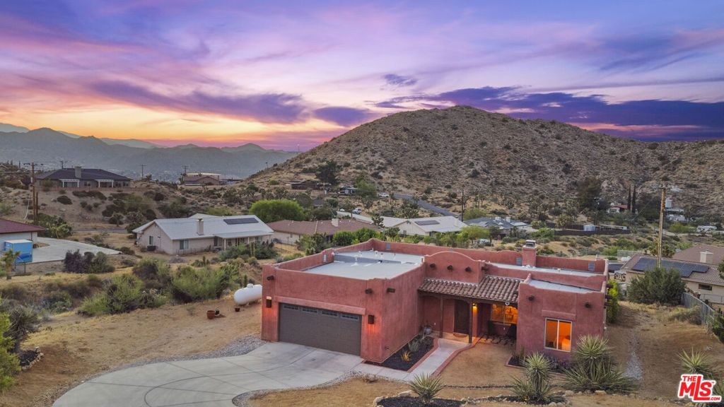 Photo of 55840 Free Gold Drive, Yucca Valley, CA 92284 (MLS # 26633833)