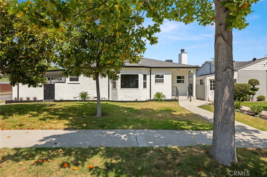 Welcome to this beautifully renovated, turn-key Burbank home that features an inviting open-concept layout filled with natural light in every room. This charming 3-bedroom, 2-bath family home is situated on a lovely corner lot, offering ample potential for multiple ADU developments and SB9 opportunities, making it an ideal setting for those looking to live comfortably while generating passive income or accommodating in-laws. The home is truly move-in ready, boasting a new roof installed in 2025, updated electrical and plumbing, a custom kitchen equipped with brand-new stainless-steel appliances, high-quality flooring throughout, recessed lighting, fresh paint both inside and out, and much more.
The updated kitchen flows seamlessly into the living room, where a cozy fireplace creates the perfect ambiance for family nights. The bathrooms have been designed with top-quality materials, ensuring both luxury living and functionality. Step outside to the backyard, which features mature fruit trees and a covered patio—perfect for play, hosting gatherings, or enjoying quiet evenings. The large corner lot offers excellent accessibility, with potential for RV or boat parking and, of course, ADU possibilities.
Conveniently located, you’ll be close to locally owned restaurants and coffee shops, as well as top-rated schools in the Burbank Unified School District, including Brett Hart Elementary, Luther Burbank Middle School, and Burbank/Burroughs High School. This home truly provides a perfect blend of comfort, style, and opportunity!