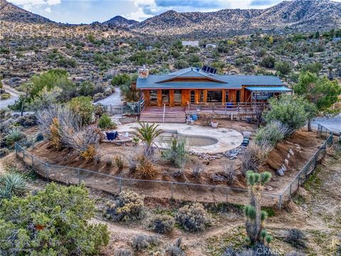 Photo of 55215 Mountain View Trl, Yucca Valley, CA 92284 (MLS # JT25264522)