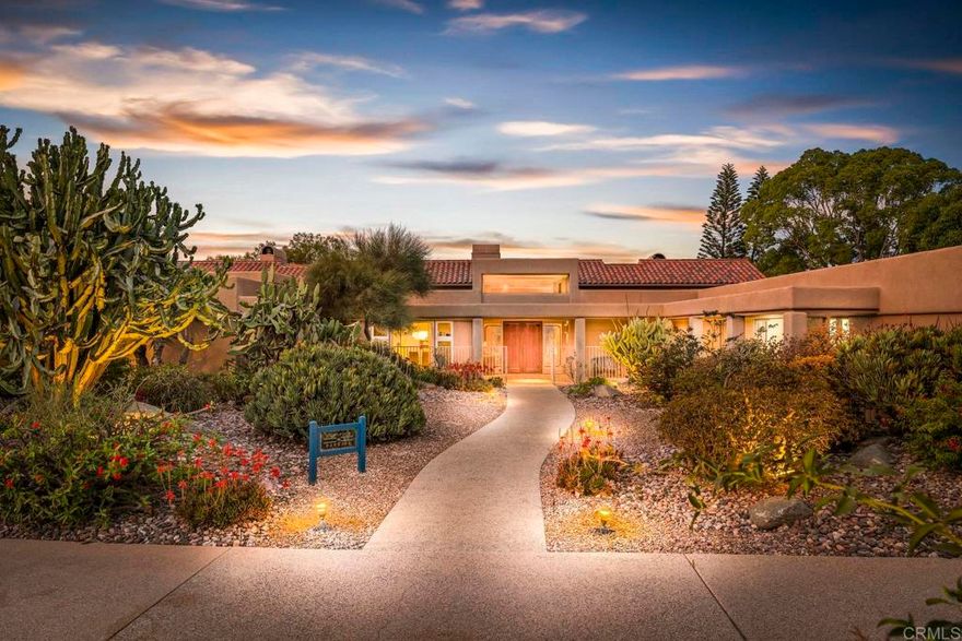 One of a kind custom single story home nestled in a tranquil setting, surrounded by bountiful gardens! No HOA This magazine worthy Sante Fe style ranch house features 4 bedrooms, 6 bathrooms spread out over 5,817 of meticulously designed living space.  As you step into this architectural masterpiece built naturally into the surrounding landscape, you will be amazed by the 5.89 acres of awe inspiring views.  The chef's kitchen is a culinary haven, featuring a large kitchen island, SubZero fridge, Wolf Appliances oven, DCS cooktop, and ample space to spread out and make your favorite meal. Host unforgettable events in the multiple living spaces or take the festivities outdoors to the entertainer's paradise, spacious patio, Mark Stasz custom sculpture and water features with an inviting in-ground saltwater pool & spa.  Luscious landscaping includes fully irrigated drought tolerant xeriscaping, an income producing protea farm, and plus orchard featuring citrus and fig trees.  After a long day, relax and unwind in the resort like oversize primary retreat featuring soaking tub, cedar lined walk in closet, sauna providing a sense of solitude.  Enjoy energy efficiencies with owned solar panels and full backup generator keeping your electricity bills at a minimum.  Tailor made oversized garages with custom car lift and fully operating 1200 square foot woodshop, provides plenty of room to store all over your vehicles, toys while enjoying your favorite hobbies.  Don’t miss the opportunity to own a one-of-a-kind oasis that blends classic California living with extraordinary beauty.  30663 Via Maria Elena is not just a home it is a lifestyle!